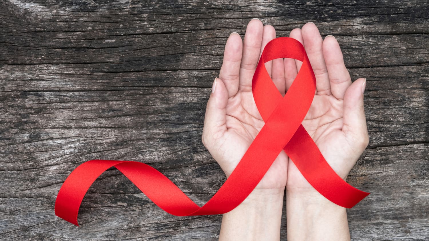 HIV simbols - sarkana lente